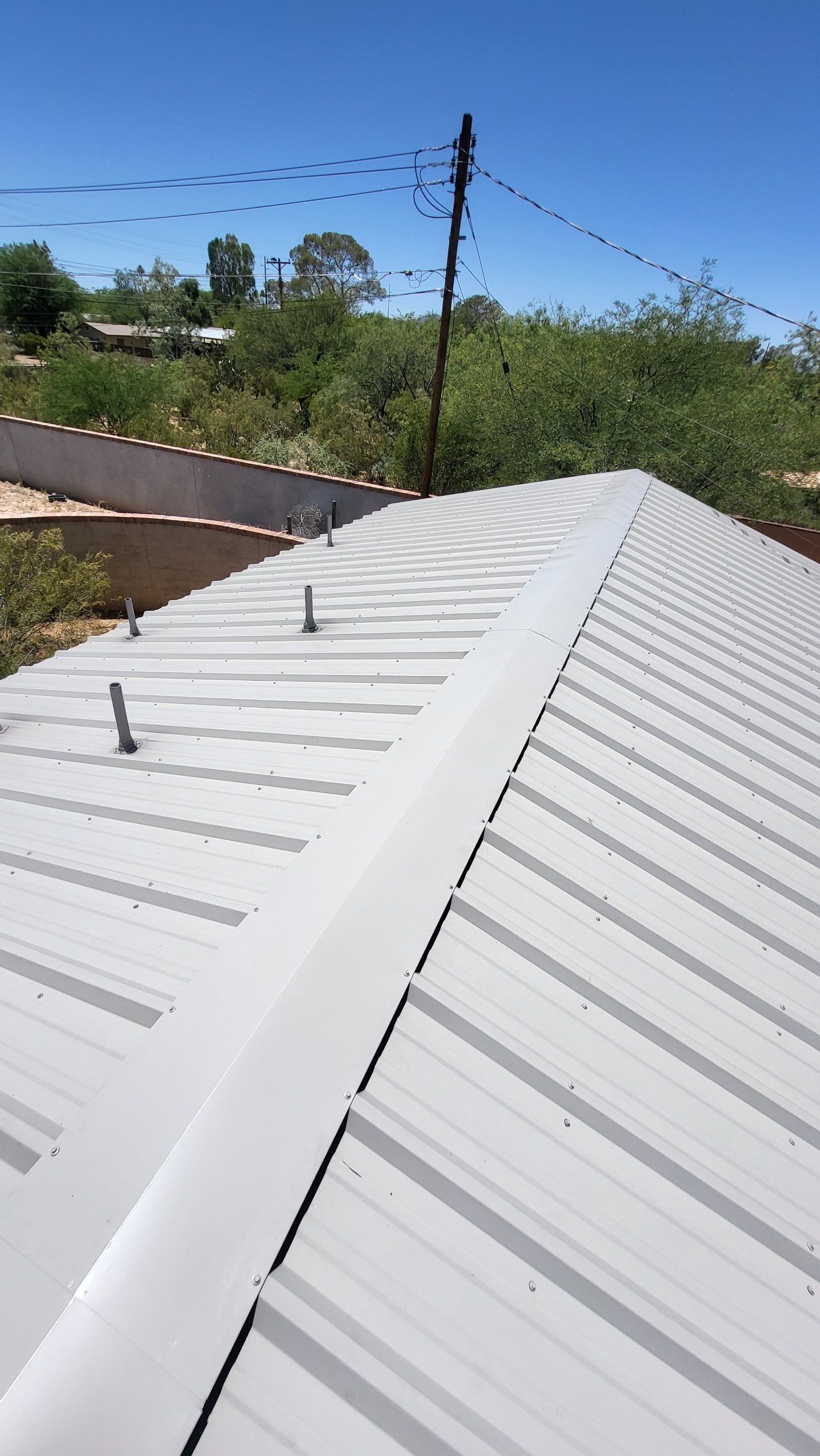 Light Stone Exposed Fastener by Reimagine Roofing