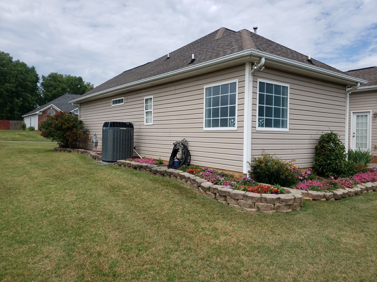 House Wash using cleaner by Power Wash Masters LLC