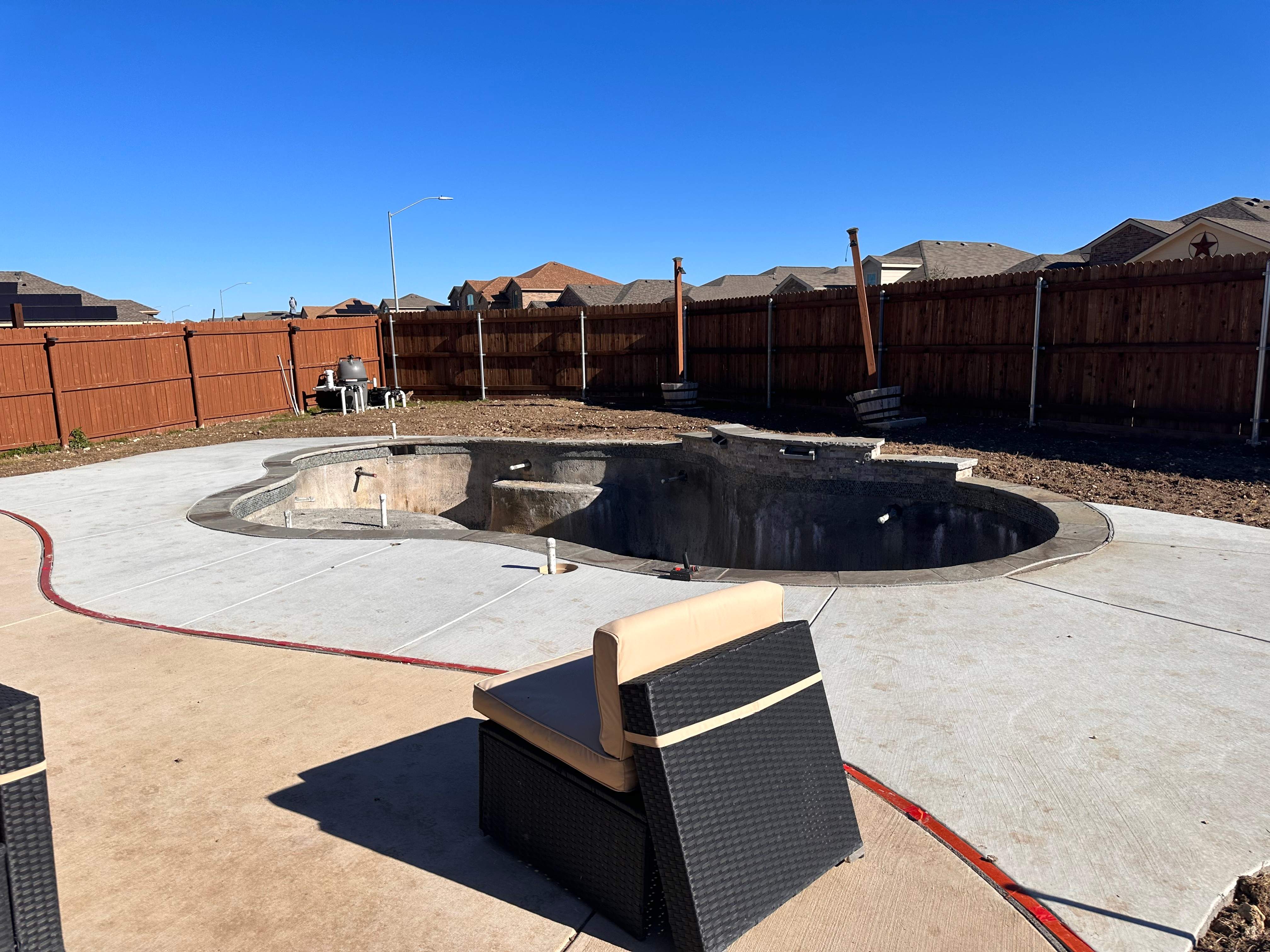 Freeform Pool with Sun Shelf by Pinnacle Pools and Spas - DFW