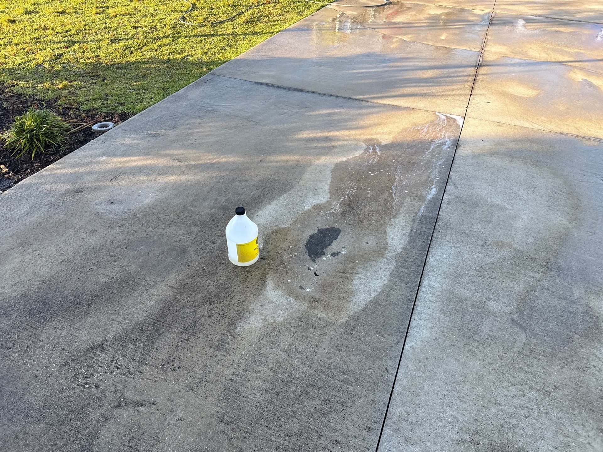 Oil Stain Removal & Concrete Cleaning – The Heights Community, Bradenton, FL by Sunshine AquaWash