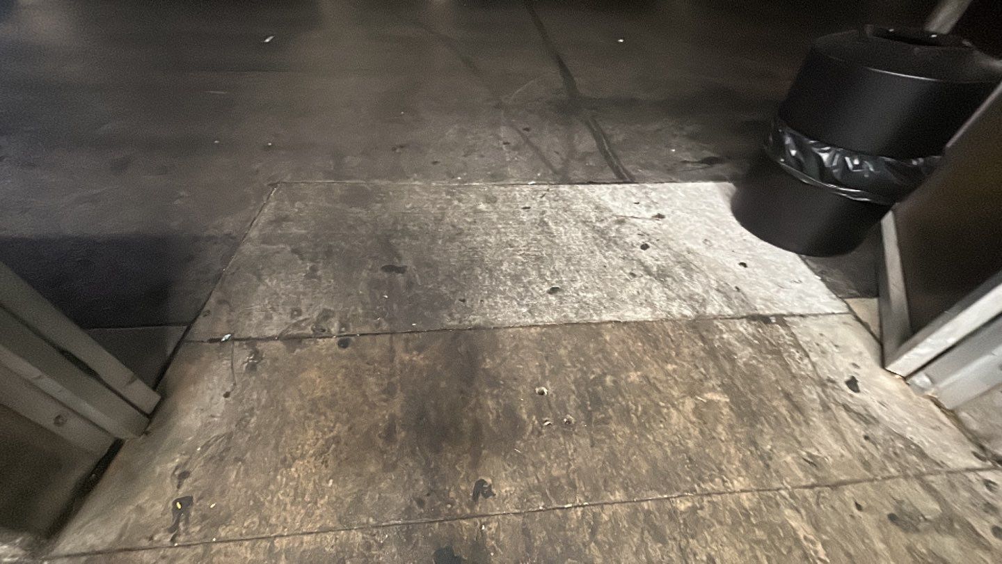 Concrete sidewalk cleaning and degreasing by Northern Power Washing LLC.