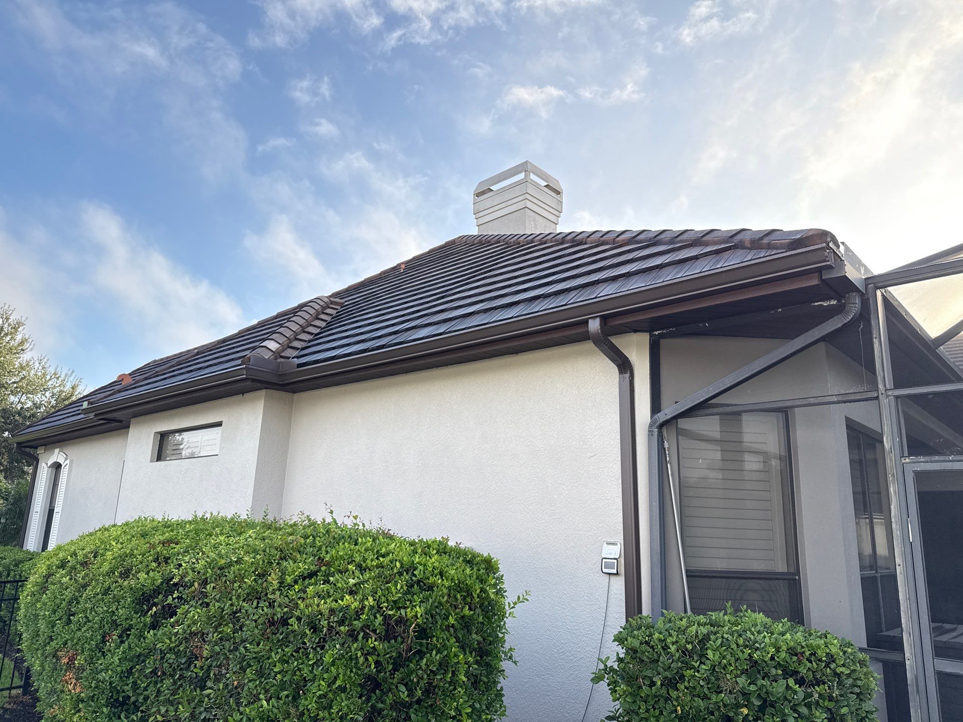 Tile Roof, Paver Pool Deck & Flowerbed Curbing Cleaning | Winding River Bradenton, FL Transformation by Sunshine AquaWash