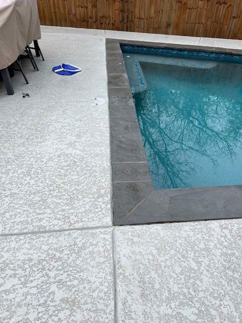 Geometric Pool with Stone Coping by Pinnacle Pools and Spas - DFW