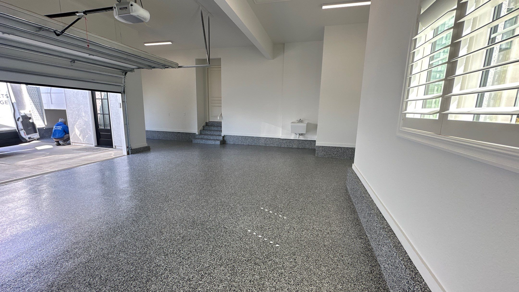 Mike & Pam transformed their garage with a Banner Garage Floor and Cabinets by Banner Garage