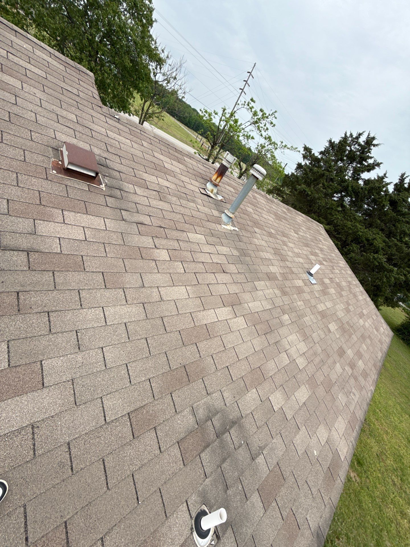 Roof replacement & Storm Door by In & Out Construction & Remodeling, LLC