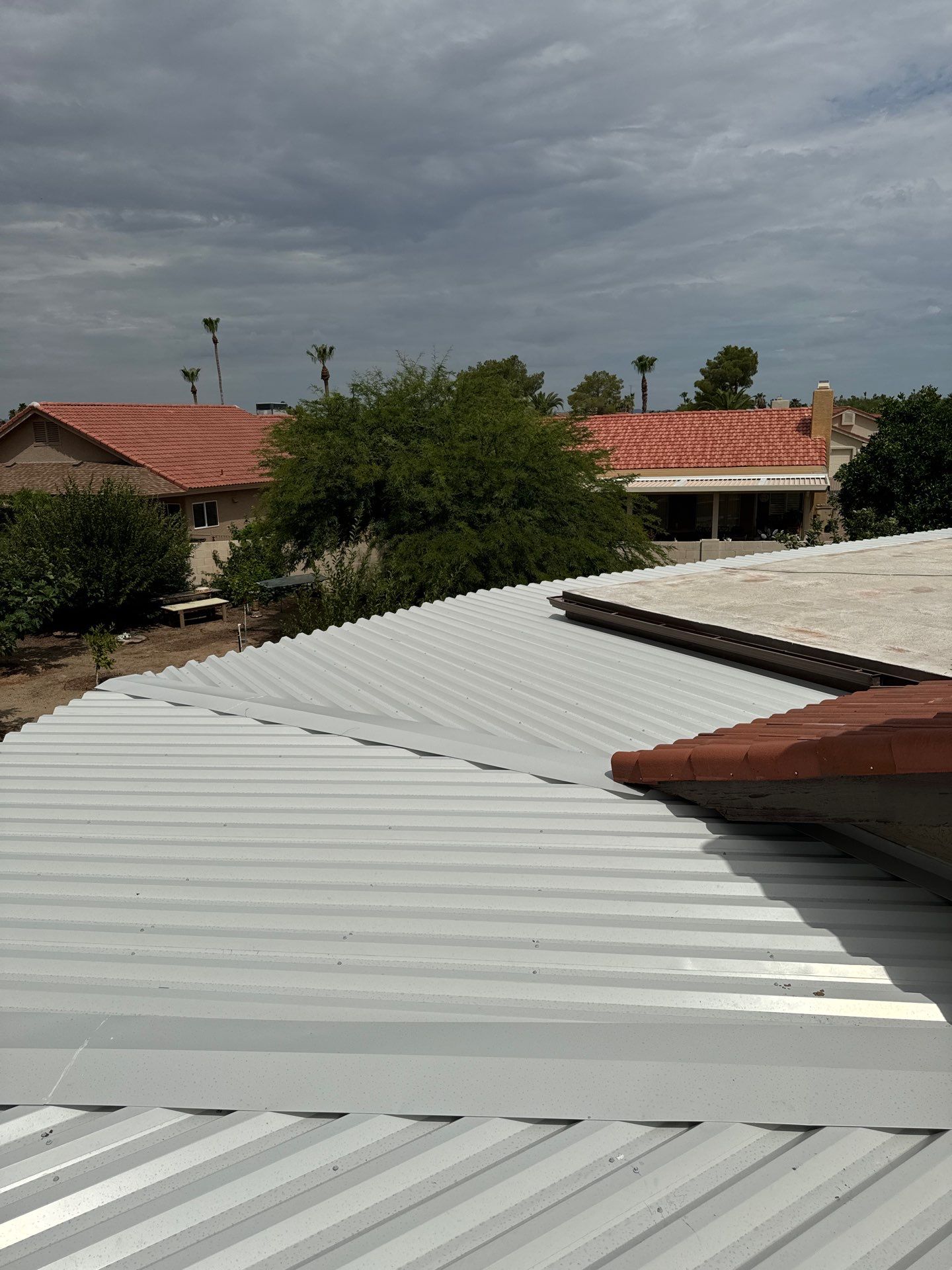 Light Gray Exposed Fastener by Reimagine Roofing