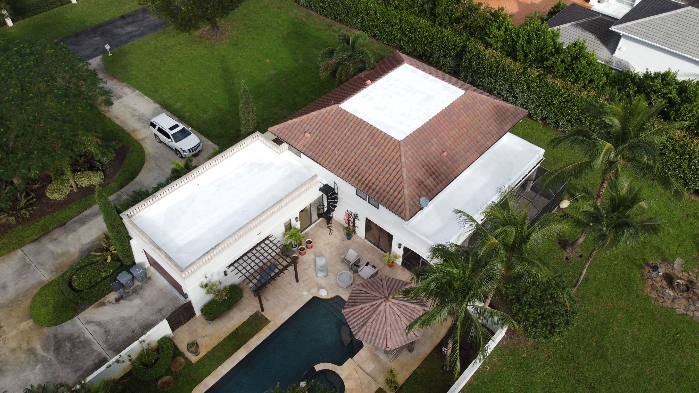 Residential Roofing Installation using Polybrite 90.1 silicone coating by BLUES BROTHERS CONSTRUCTION CORP