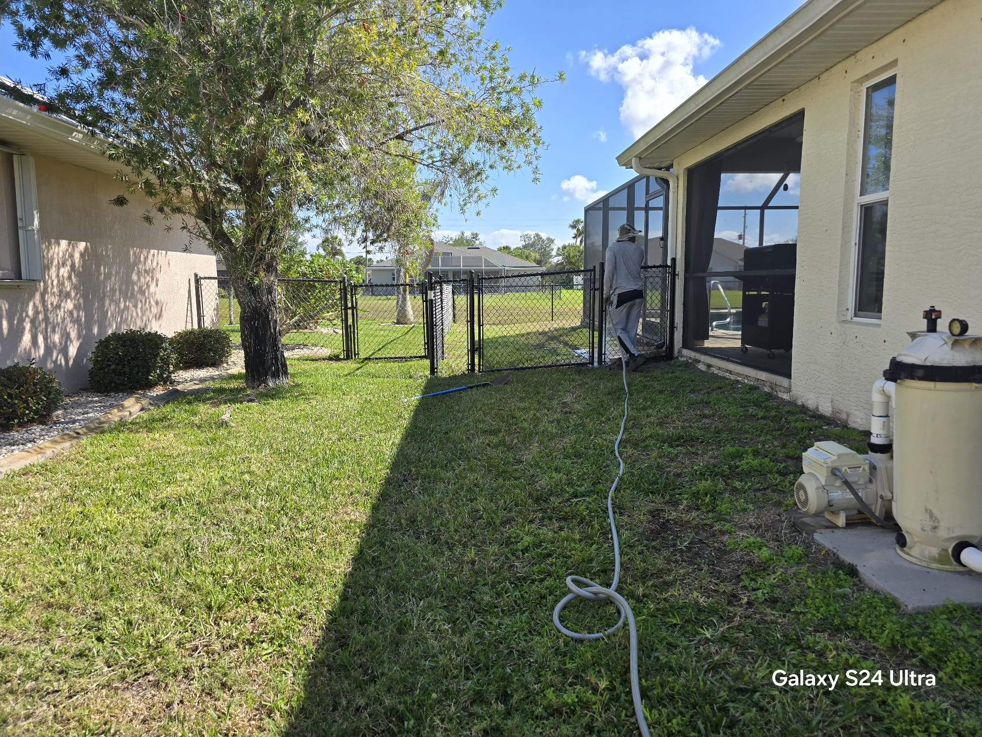 Waterfront Black Chain Link Fence Installation in Rotonda West by True Fence LLC