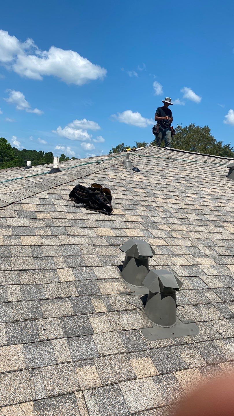 Residential Roofing Installation using Roof Replacement by American Roofing & Construction LLC