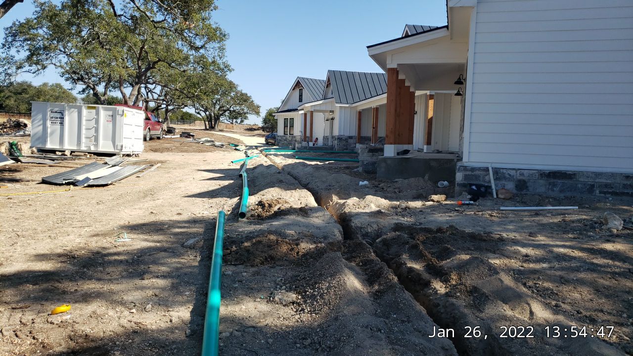 30K gallon mangrove green tank for residential rain water harvesting, Dripping Springs, TX by Hill Country Rain Water