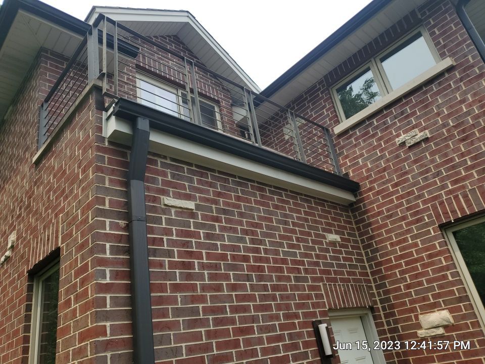 Highland Park, IL Bluestone, concrete,  Trex deck cleaning by Northern Power Washing LLC.