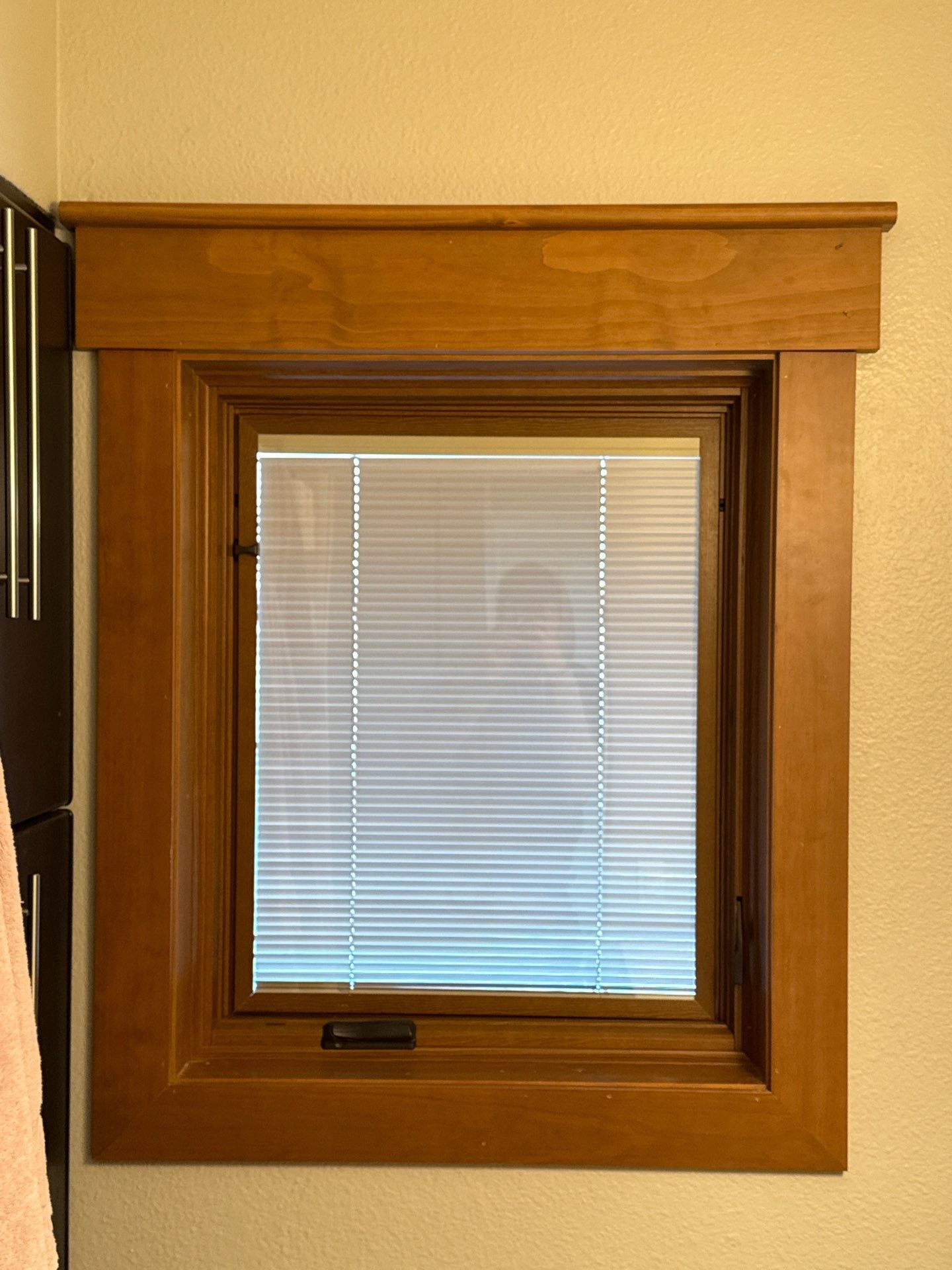 Black-Frame Pella Lifestyle Upgrade on a Partial Brick Home by United Windows and Siding LLC