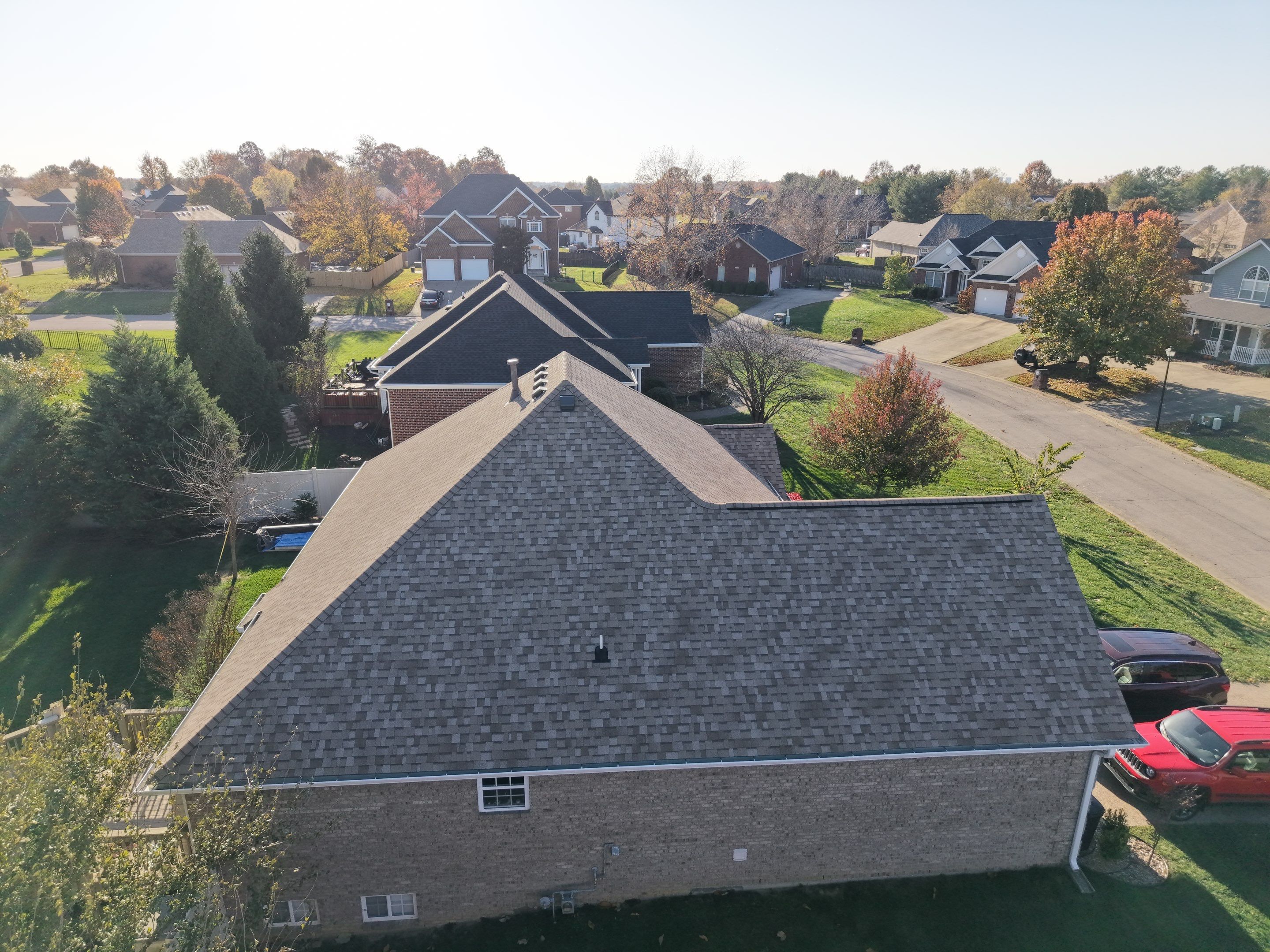 Owens Corning Duration - Sand Castle W/White Gutters by Stout Exteriors