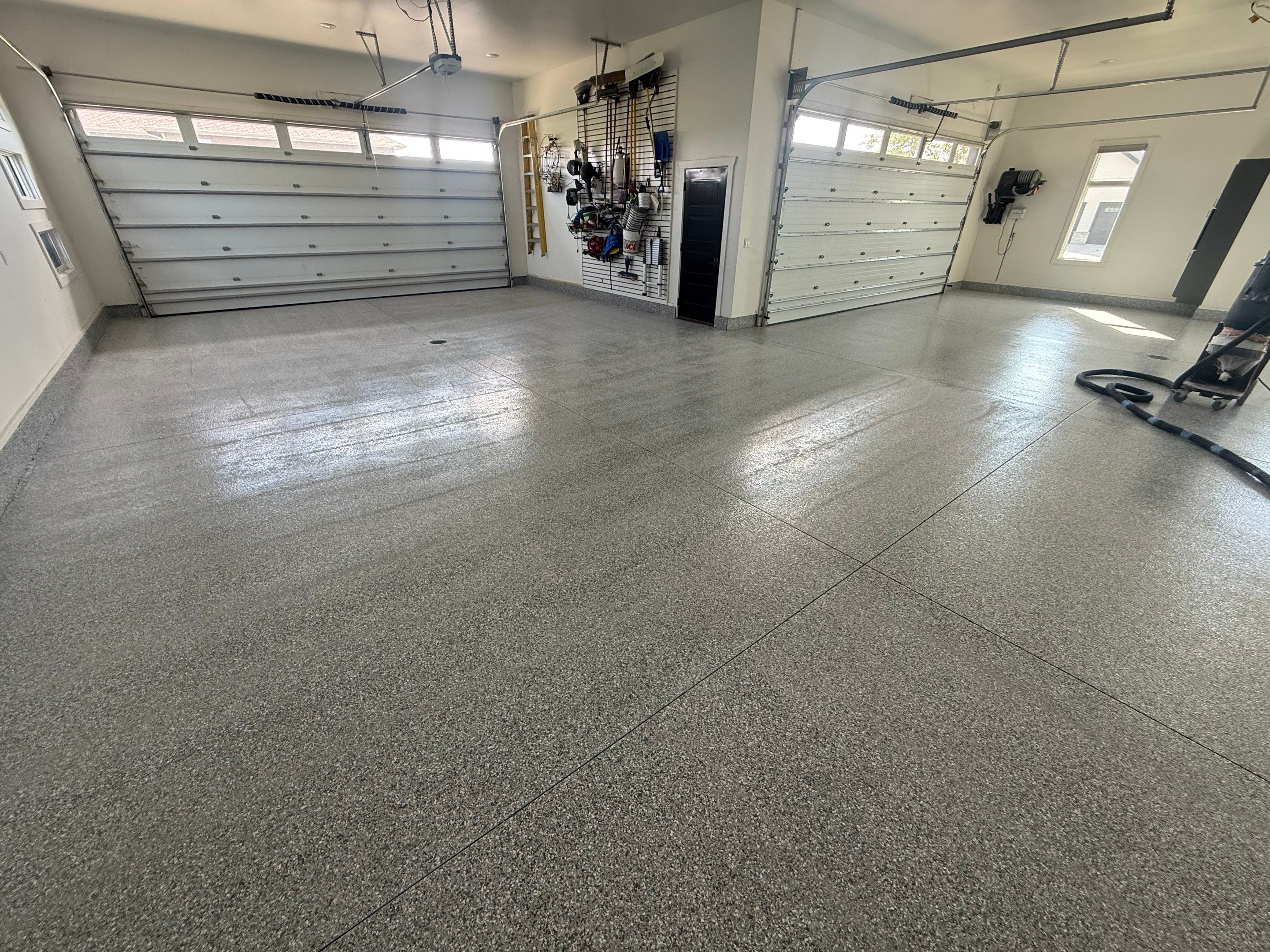 Gravel Flake Garage Floor Coating in Yankton by Select Painting, Coatings & Garage Cabinets