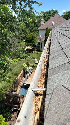 Turtle Shell gutter protection installation in Oswego, IL 60543, photograph 5