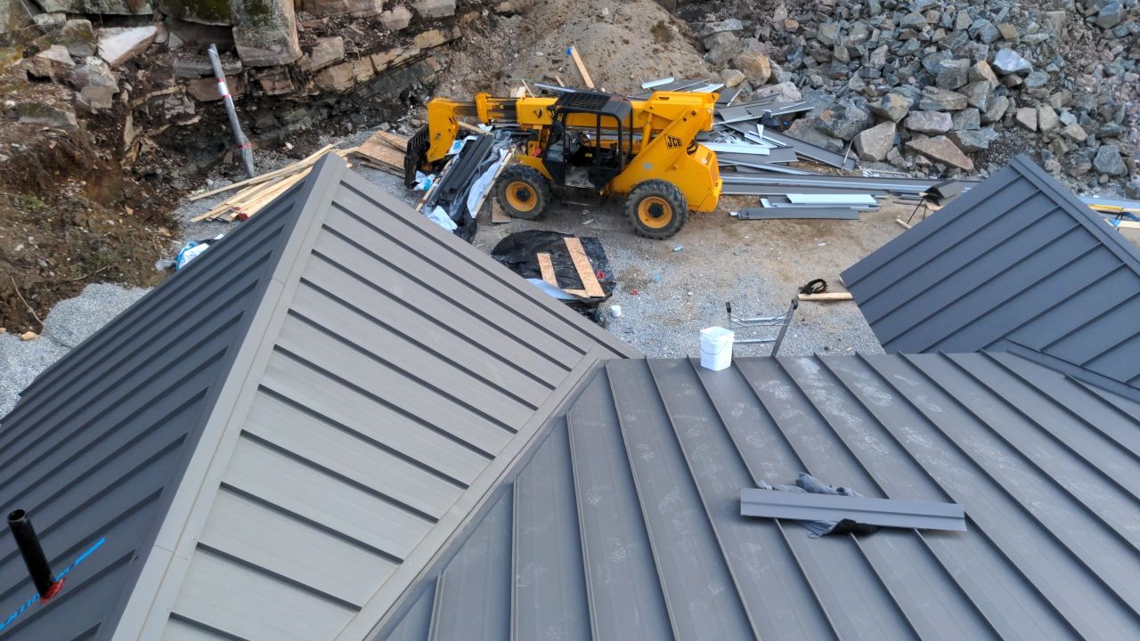 New Home Construction using 16" Standing Seam Panels by Jay Carter Roofing & Sheet Metal