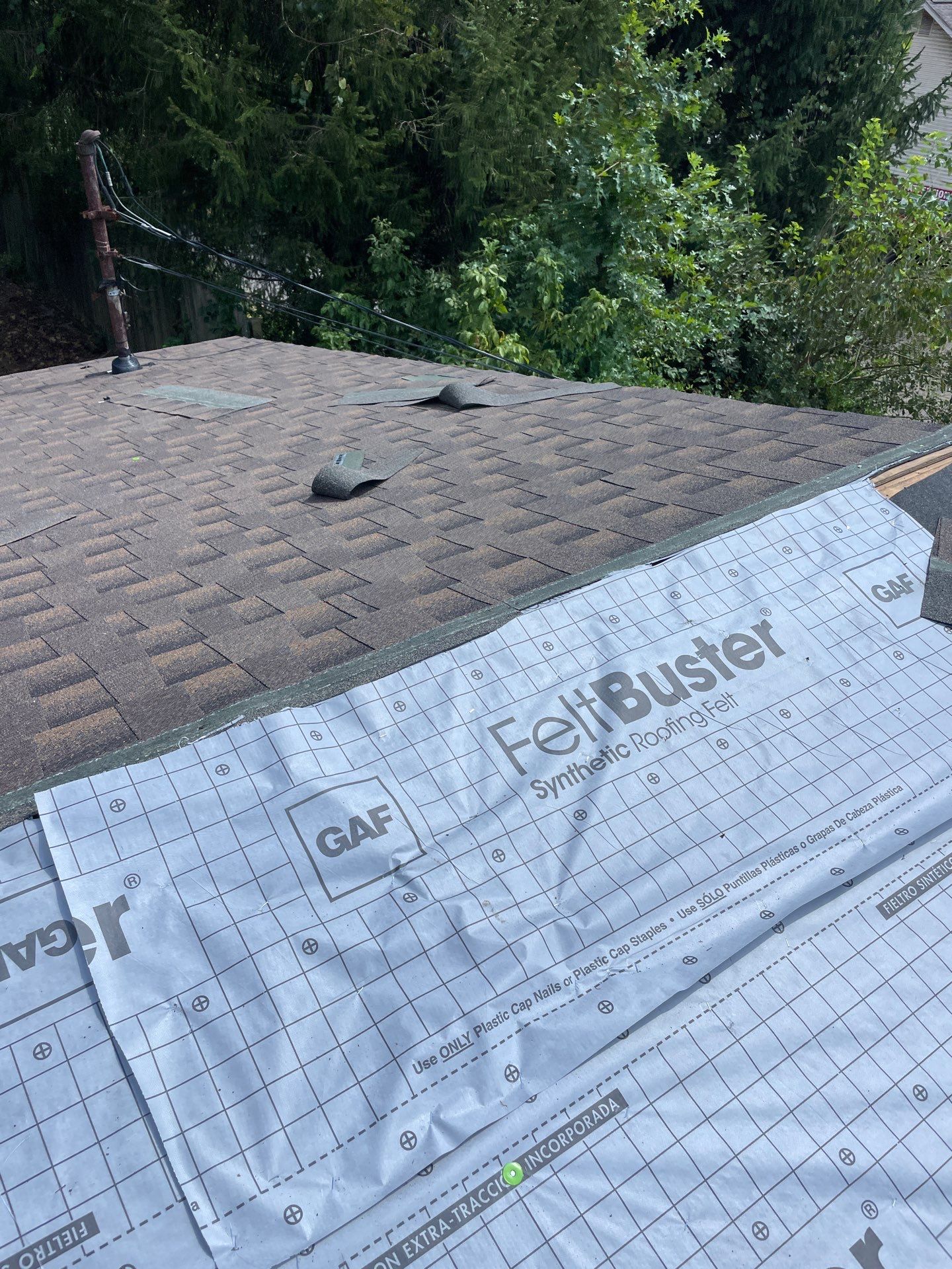 Residential Roofing Installation using GAF TImberline HDZ Hickory by Rainstoppers Roofing