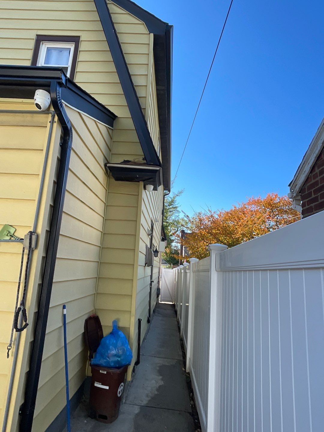 Full House Installation 5" black seamless gutters and 2x3 leaders using 5" black K style seamless gutters and 2x3 black leaders by Above All Gutters