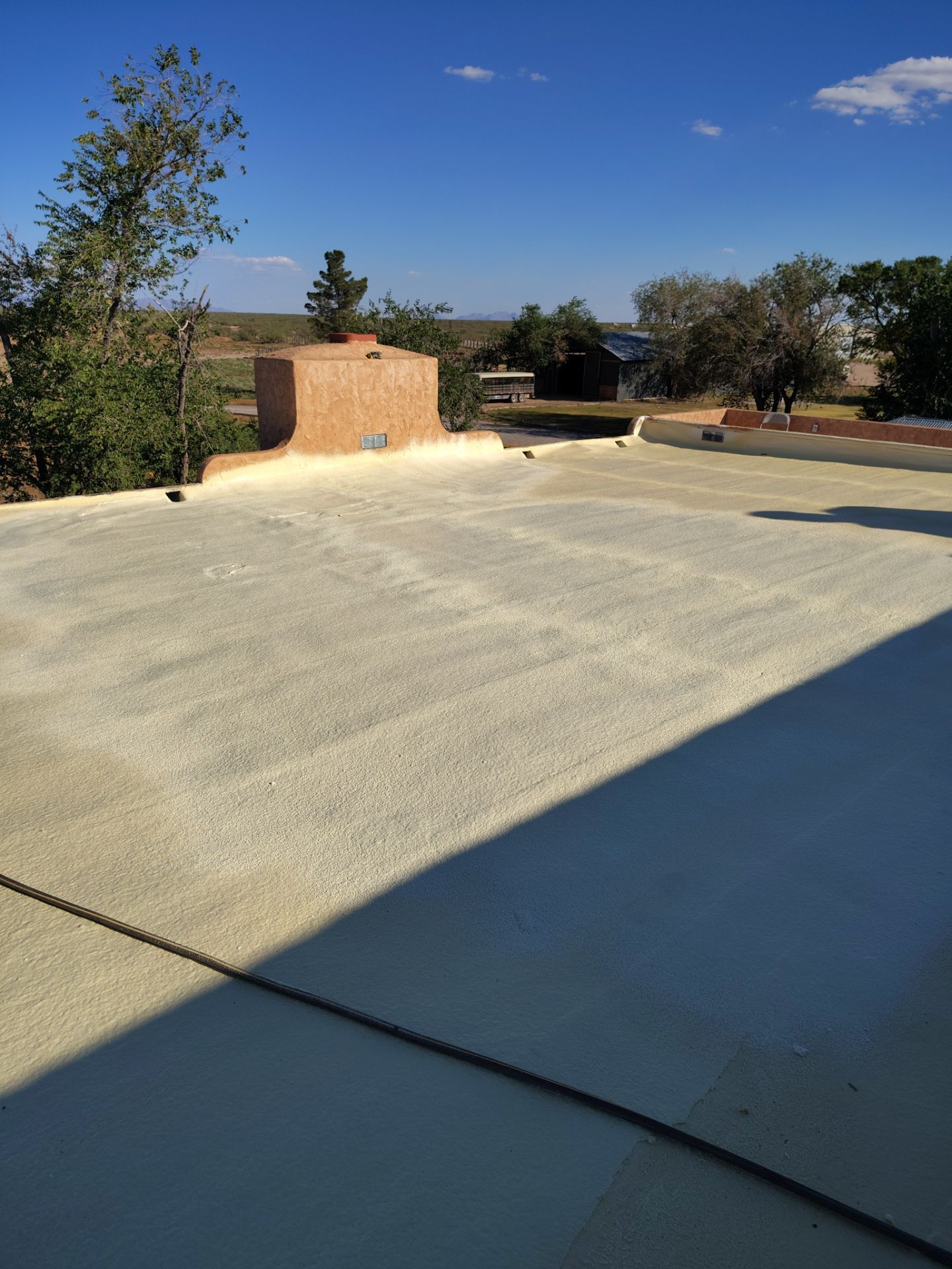 Residential roof application by SPF Services 