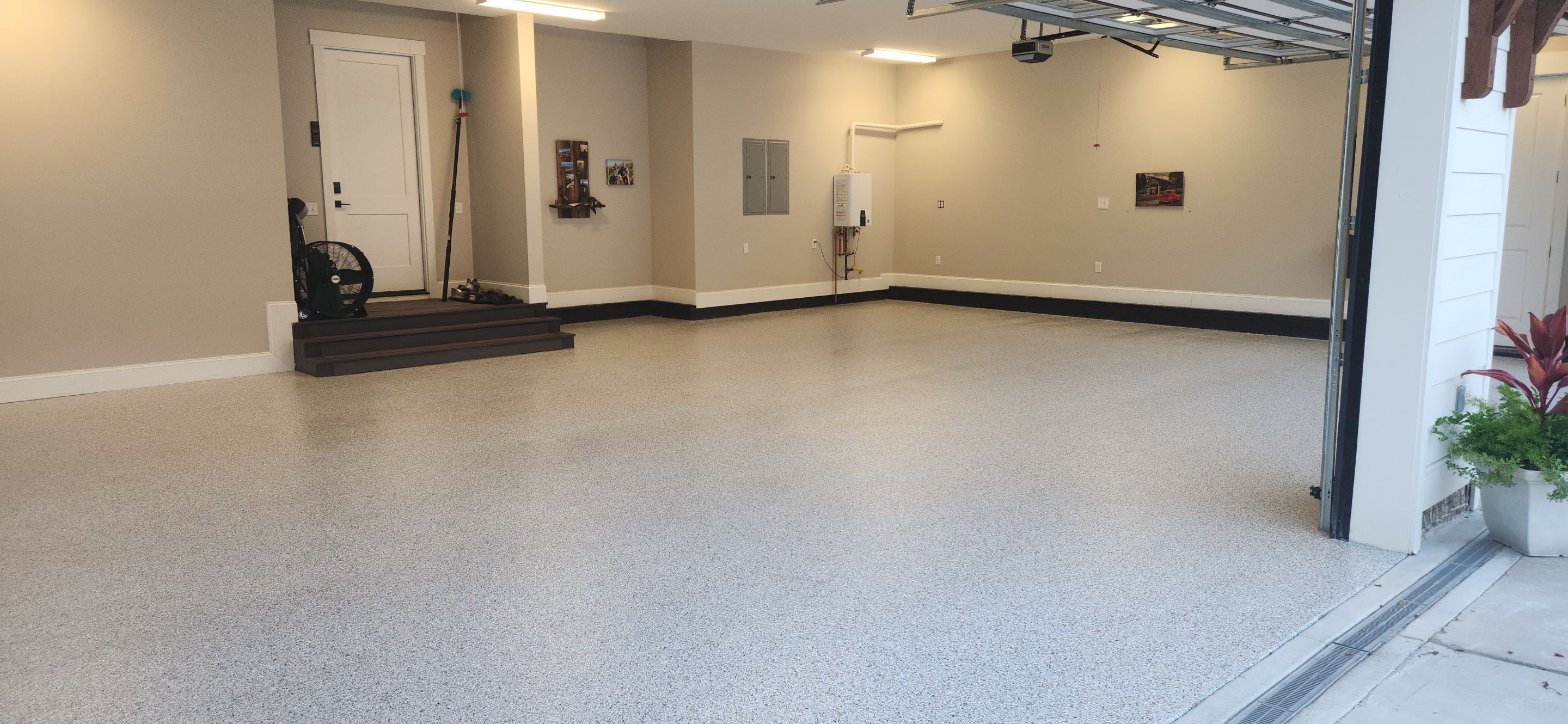 Front Porch and Garage using Coyote & Pumice by Elite Floor Solutions
