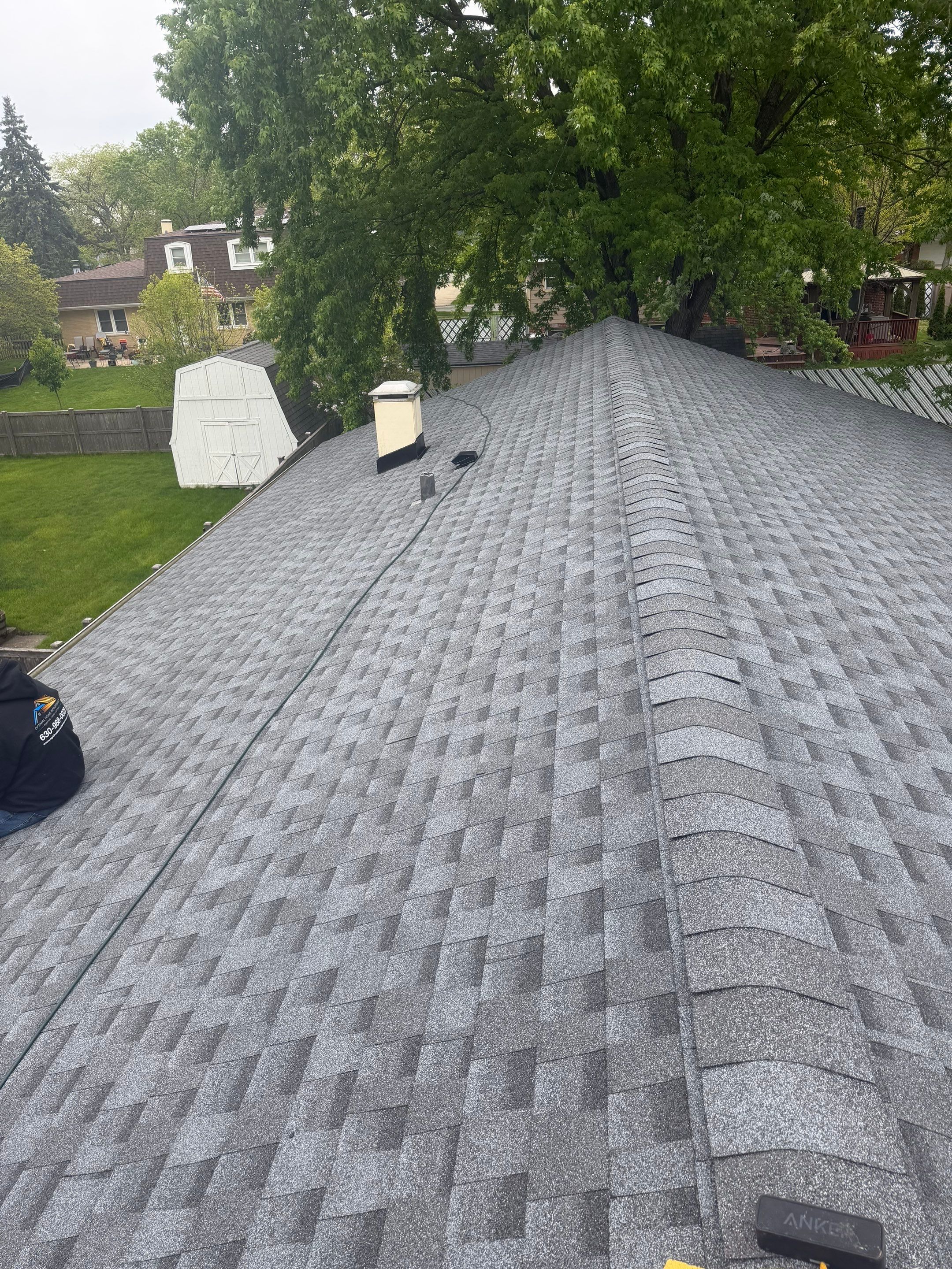 Roof replacement and chimney flashing by Optimal Home Improvement 