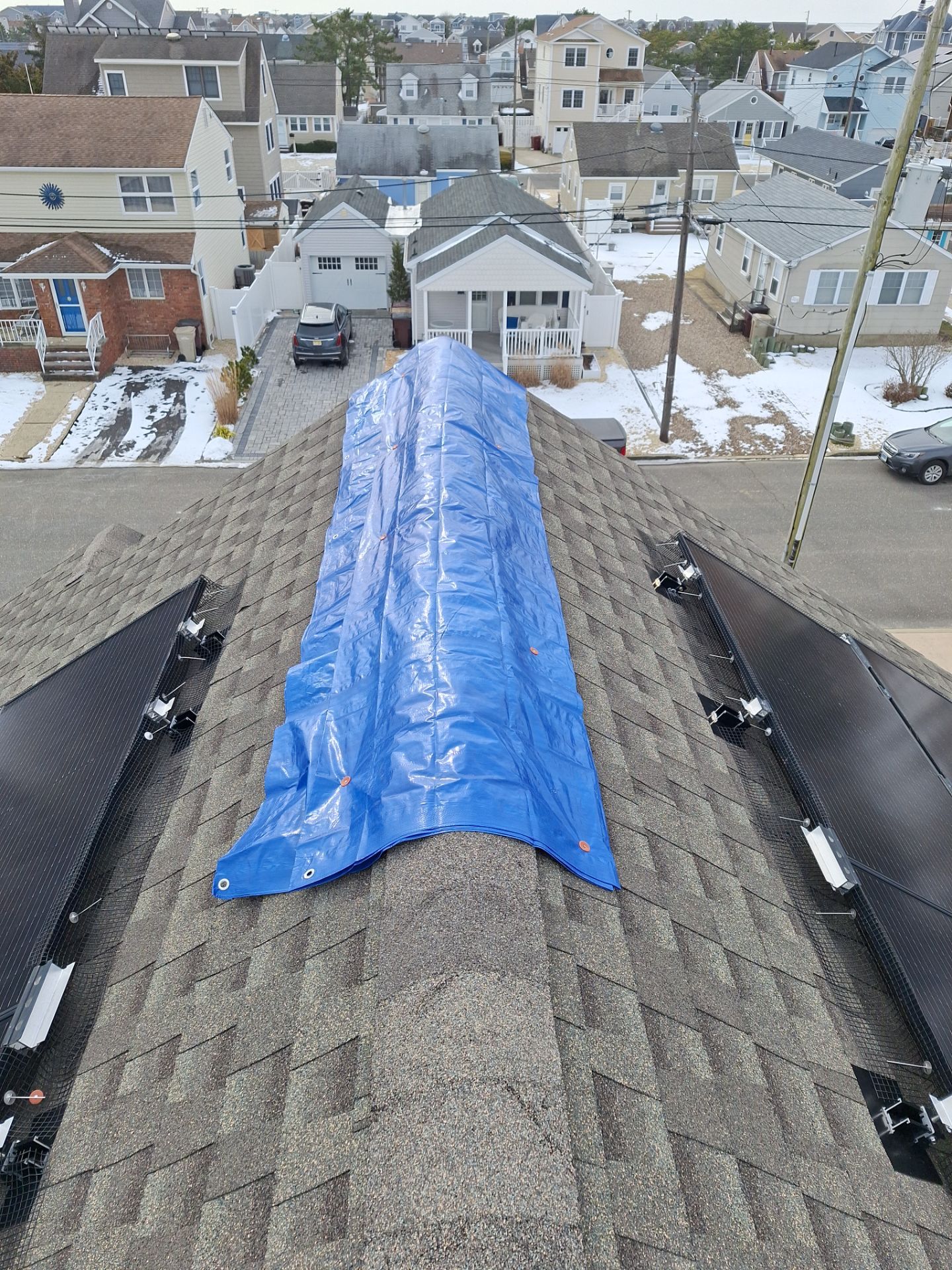 Estate Gray Shingles by Reimagine Roofing