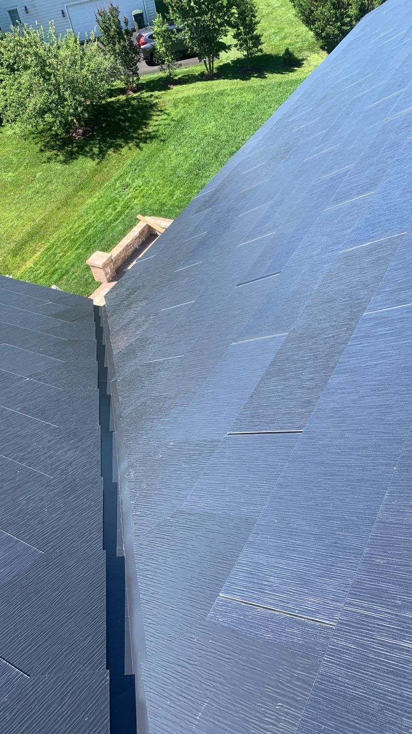 Tesla Solar Roof Replacement using Tesla Solar Roof V3 tiles by American Home Contractors