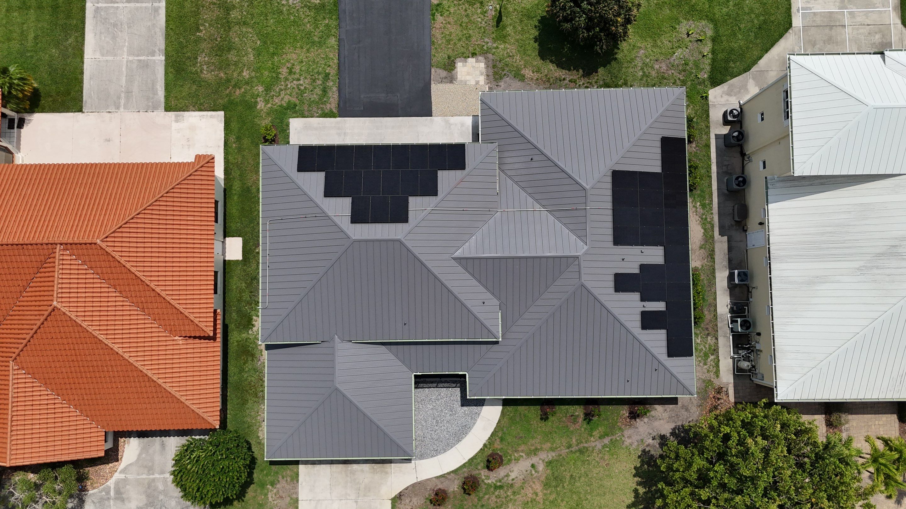Standing Seam Metal Roof and Solar Powerwall Installation in Naples by Coastal Energy