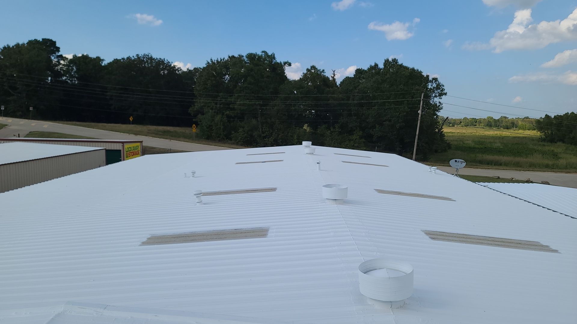 Commercial Metal Restoration System using Aldocoat Coatings by Hostetler Roofing