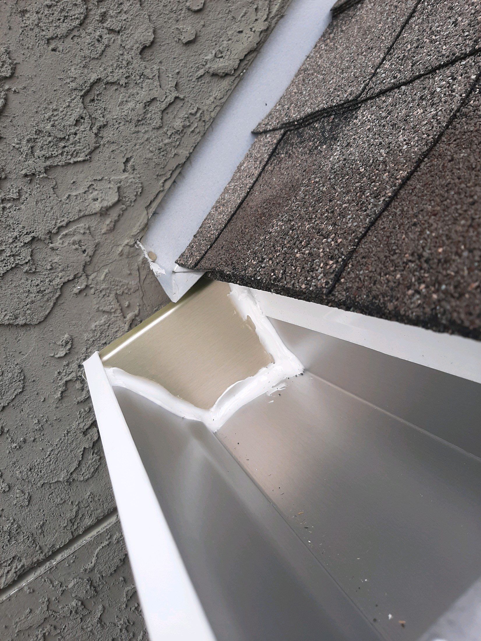 Seamless Gutter Installation using White K-Style Gutters by Gutter Professors