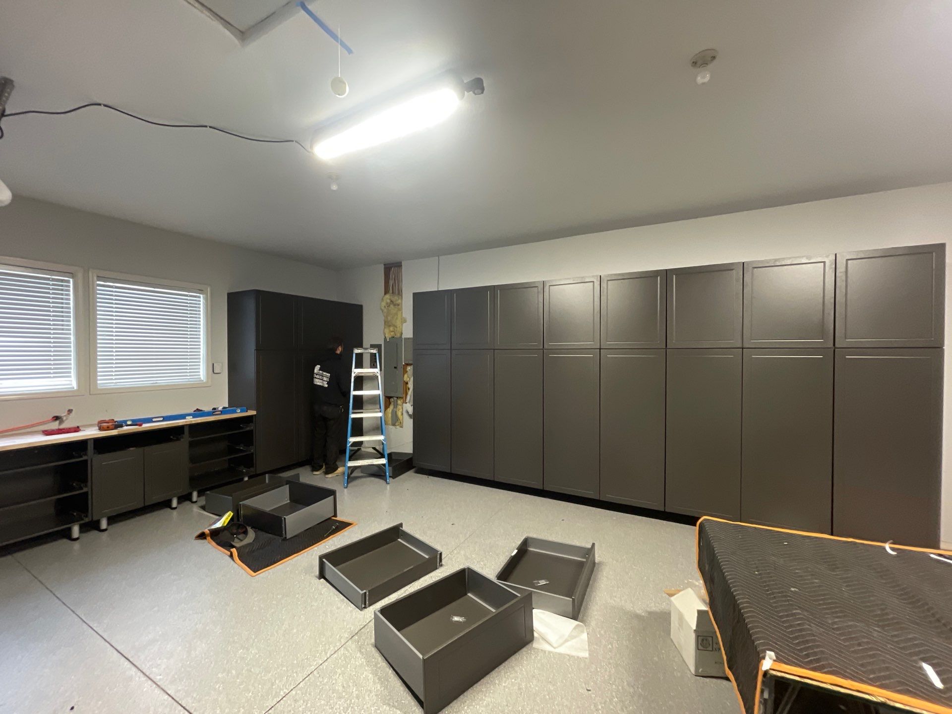 Garage Transformation using Canfield Hybrid & Grey Croc Cabinets by Croc Coatings, LLC