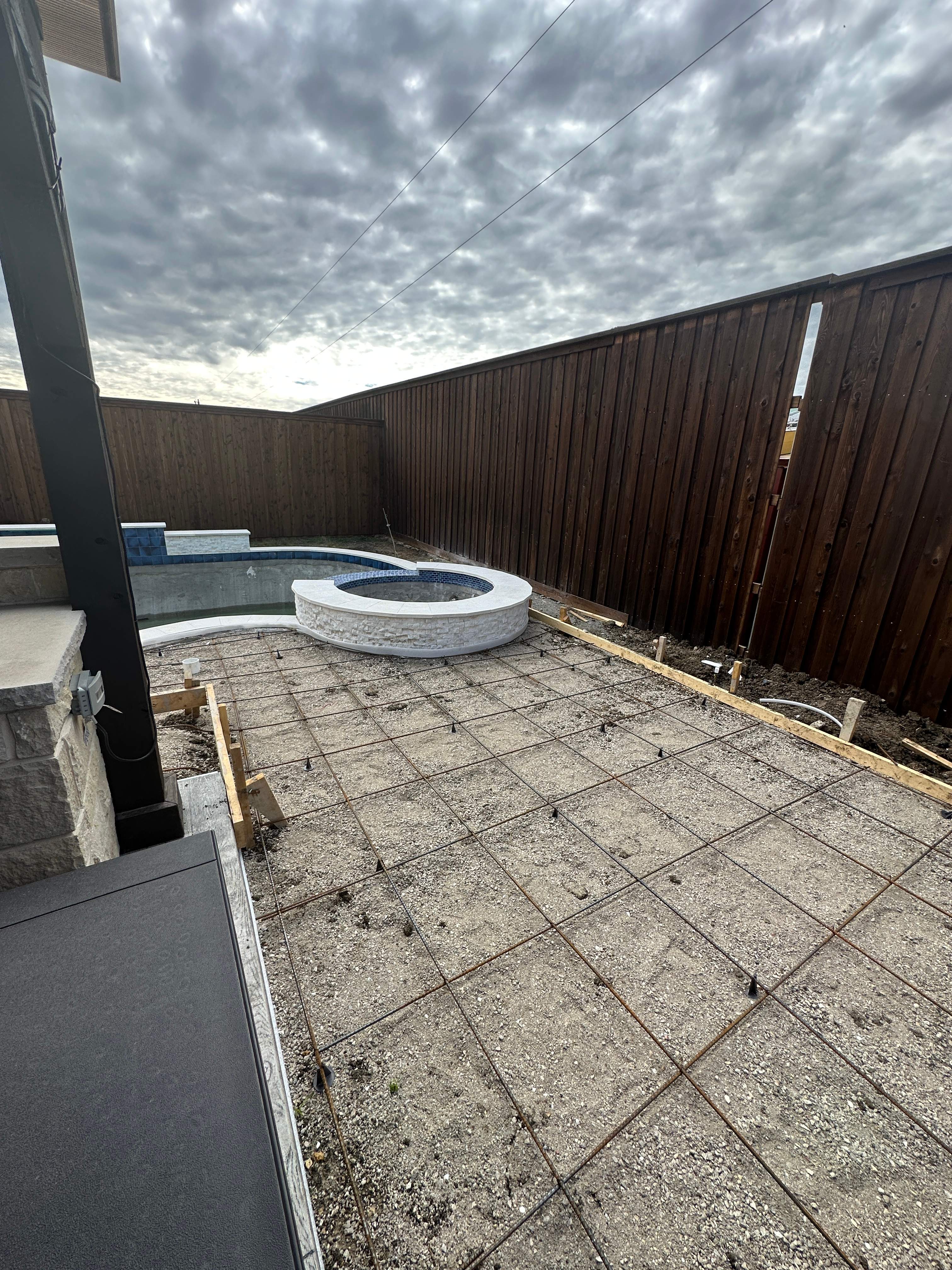 Freeform Pool with Rock Waterfall and Raised Spa by Pinnacle Pools and Spas - DFW