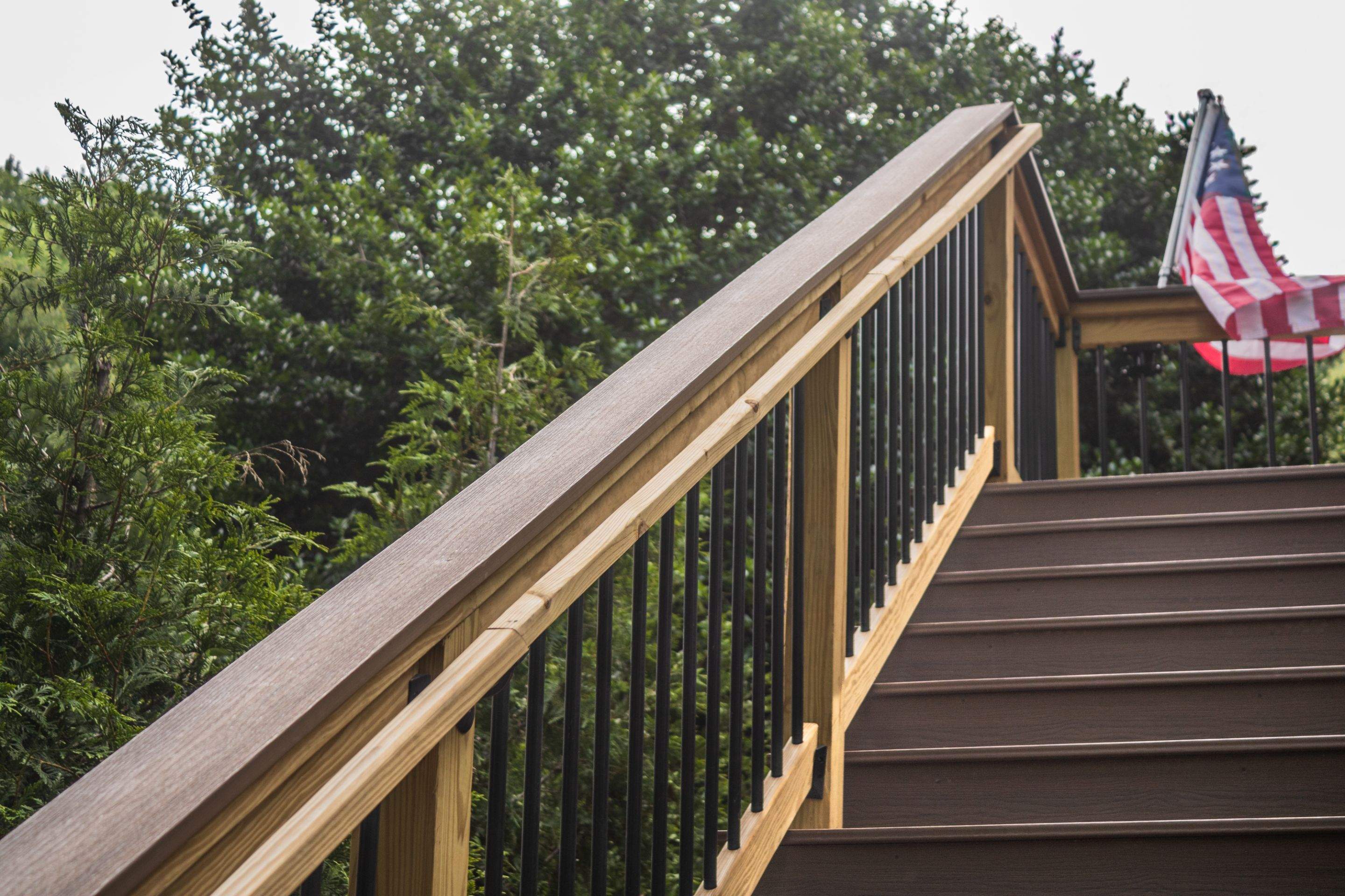 Tucker, GA Covered Porch Build and Deck Replacement using Deckorators Voyage Series Decking by Nelson Exteriors 
