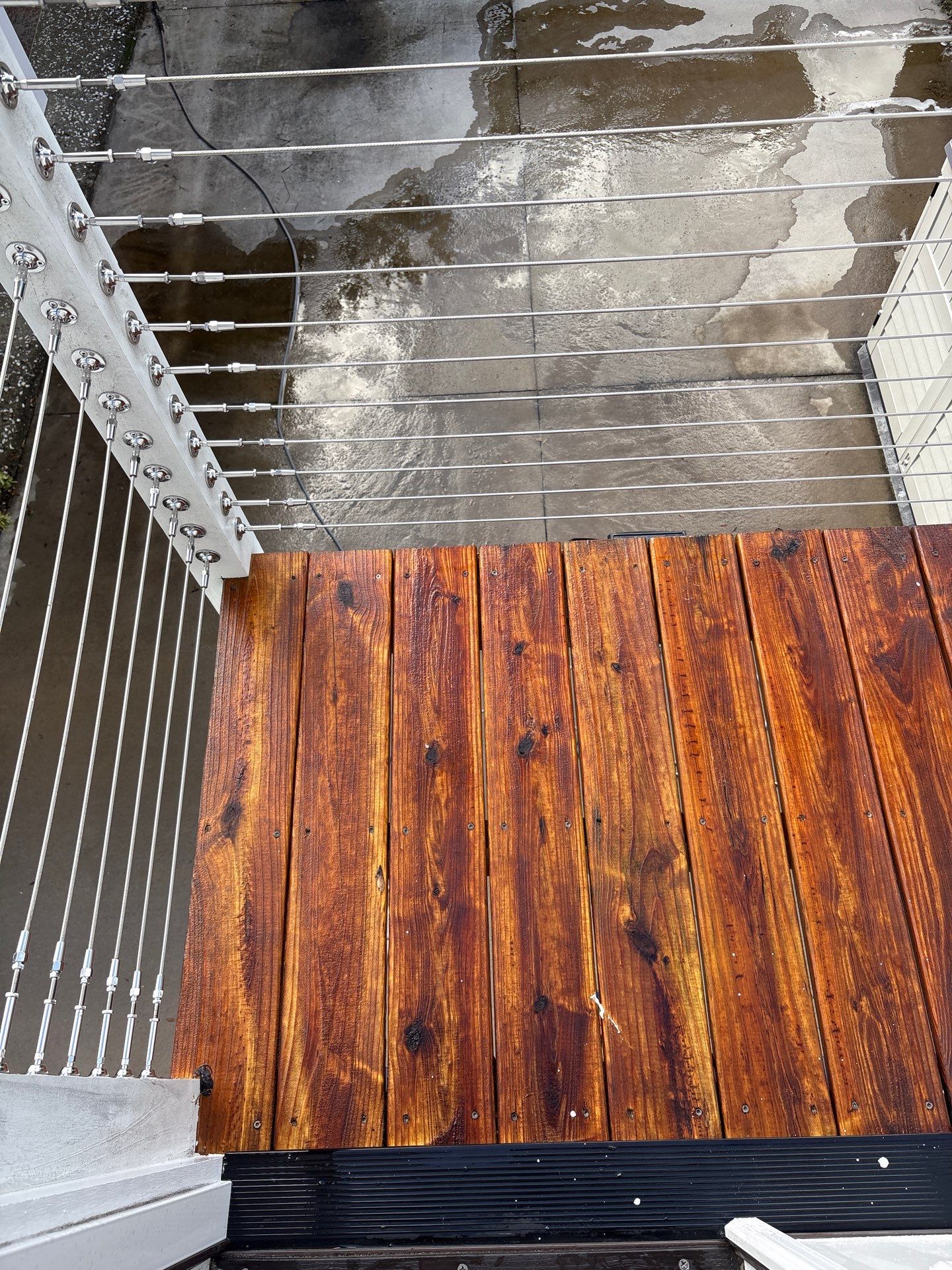Wood Deck and Concrete Driveway using Wood and Concrete Sealant by DuraSeal