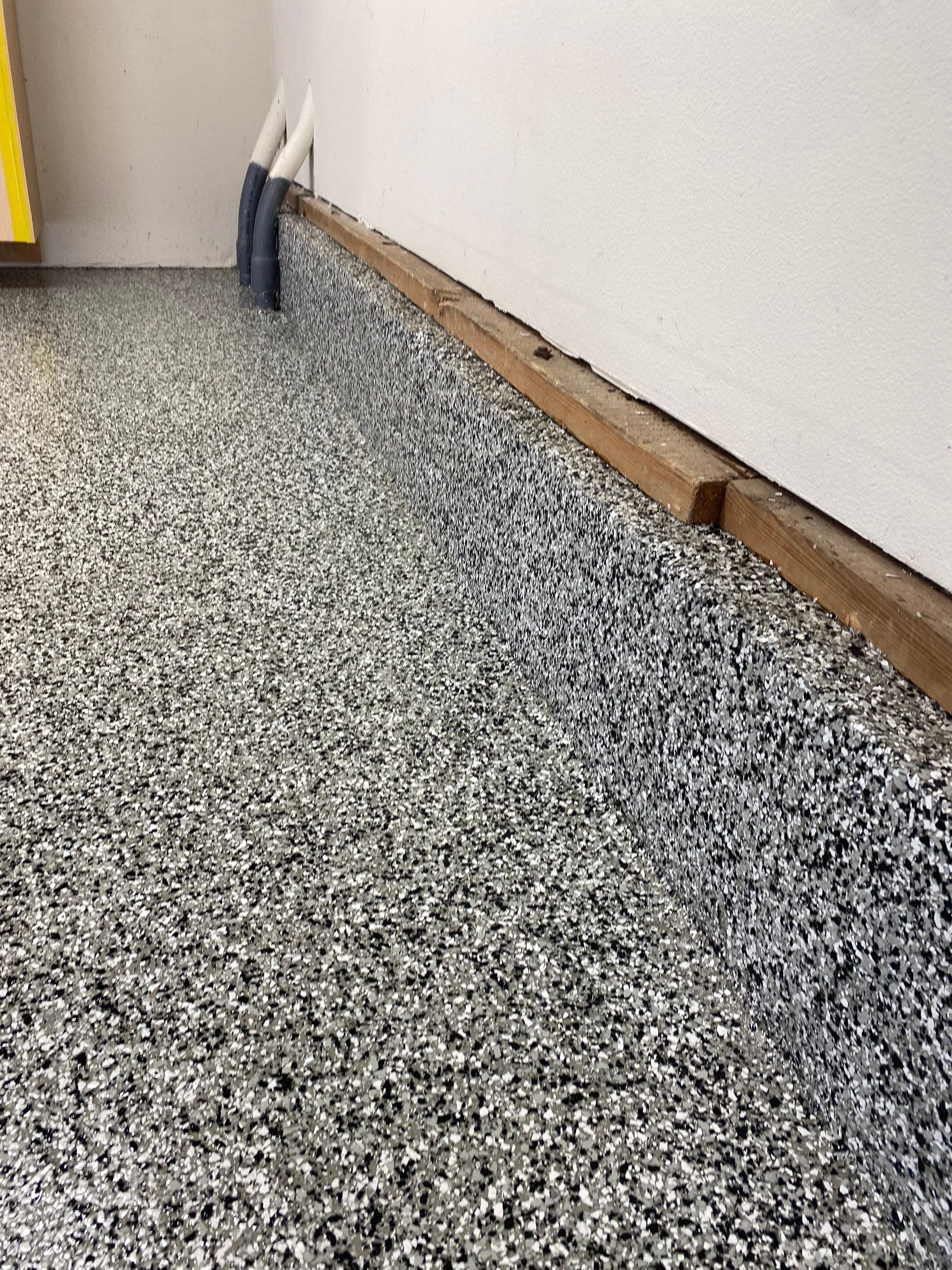 Garage Transformation using Domino by Croc Coatings, LLC