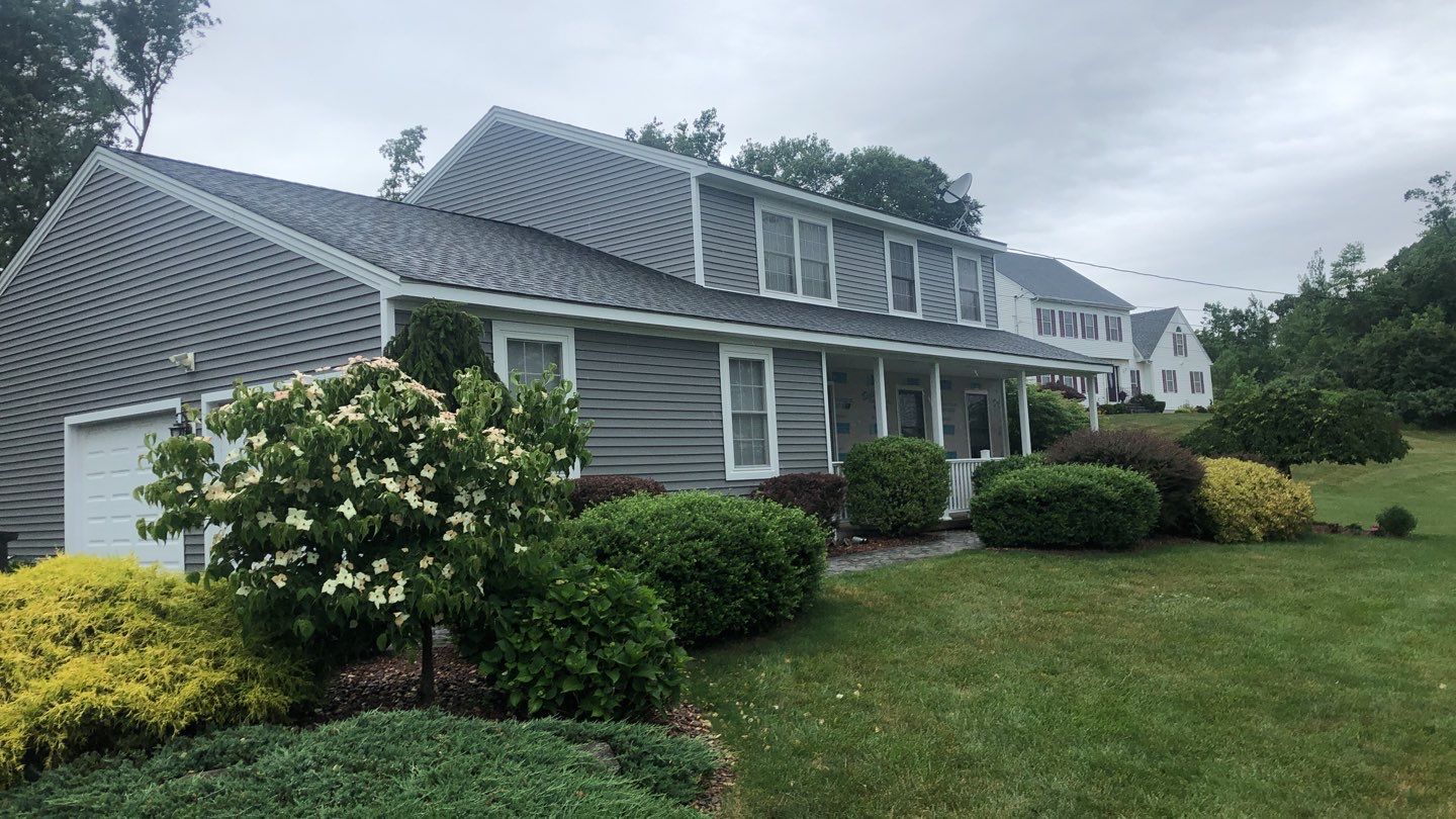 Siding Installation using Certainteed Monogram Charcoal gray and Owens Corning Versetta Stone Sterling by A Plus Exterior