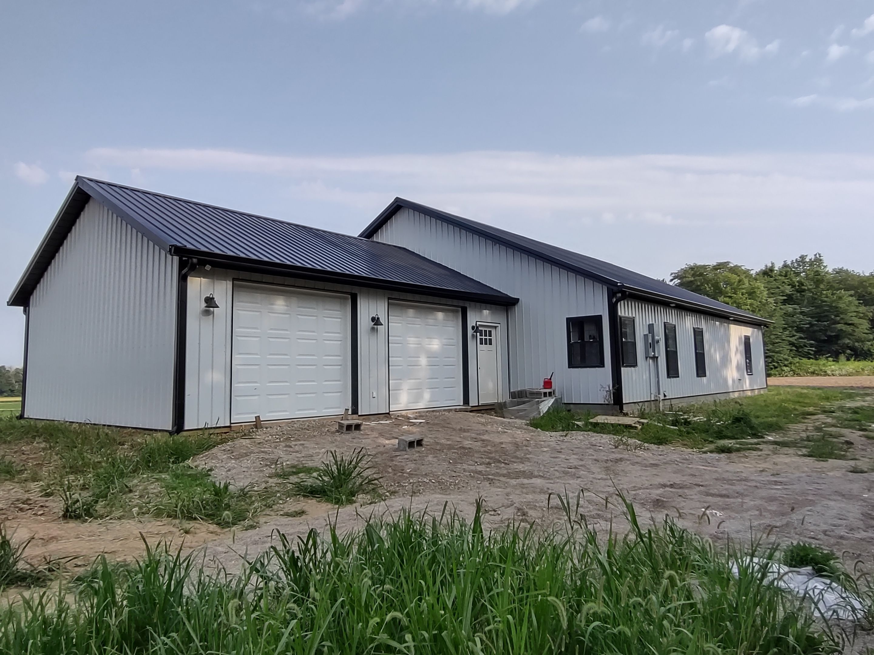 Pole Barn Home  by The Barn Builders 
