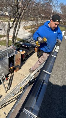 Turtle Shell gutter protection installation in Wheaton, IL 60189, photograph 16
