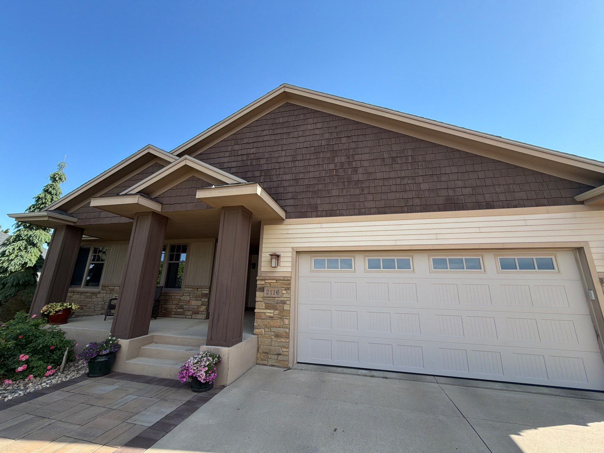 Sioux Falls Exterior Refresh and Multi-Level Deck Maintenance by Select Painting, Coatings & Garage Cabinets