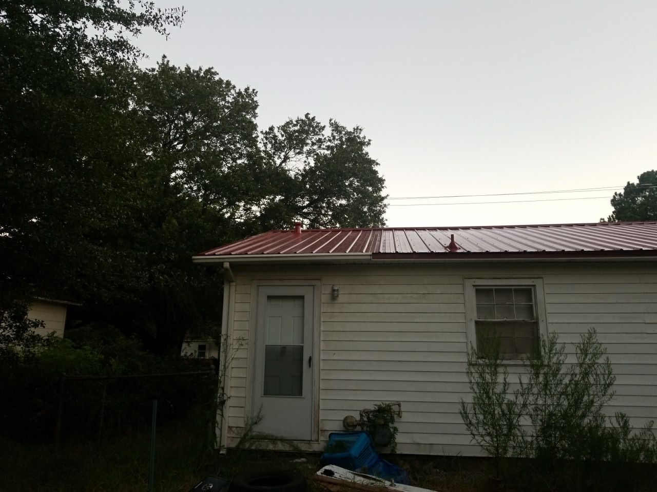 Residential Roofing Installation using Metal roofing by American Roofing & Construction LLC