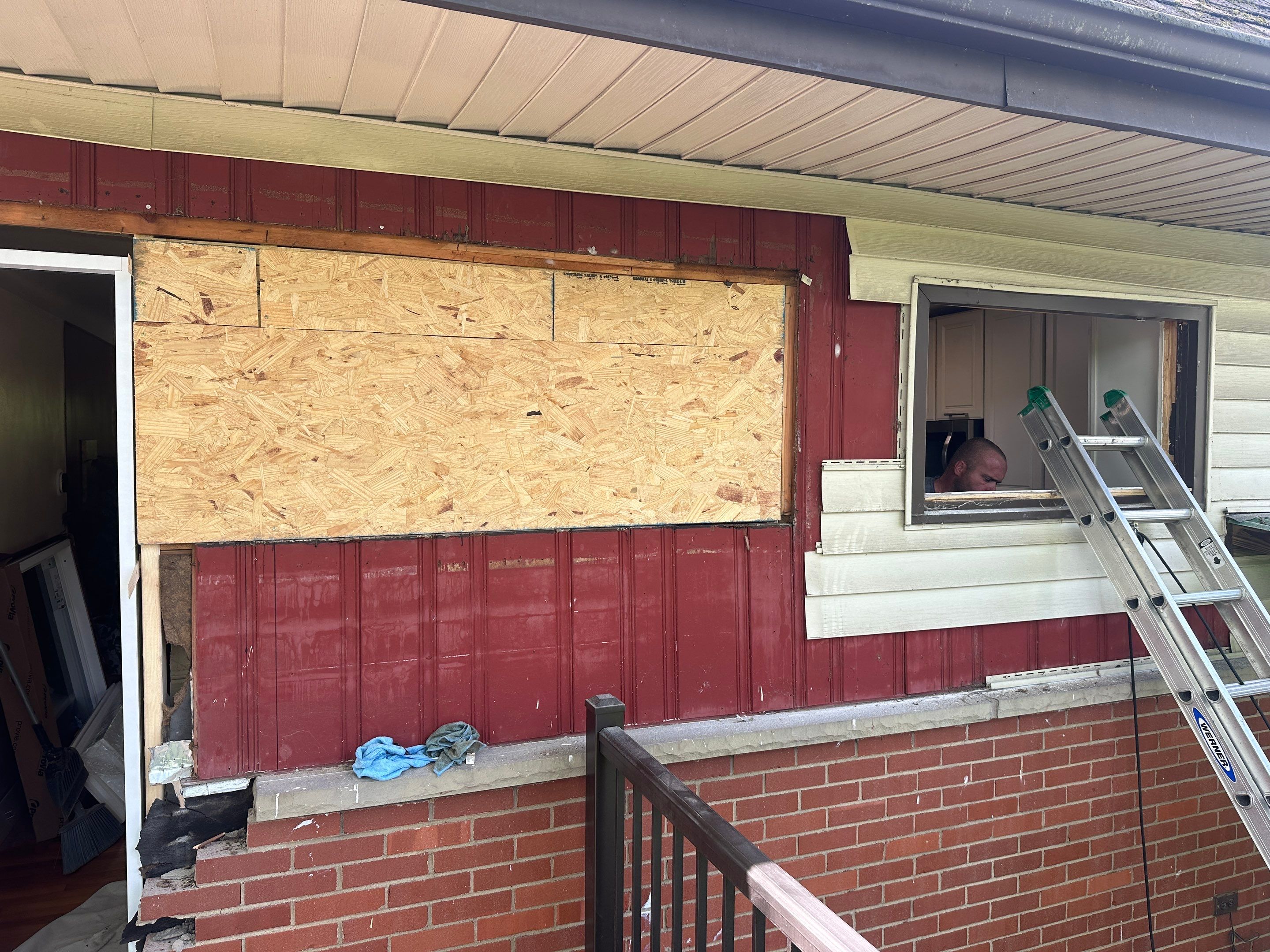 Deck and door install by Cousins Roofing Siding & Decks