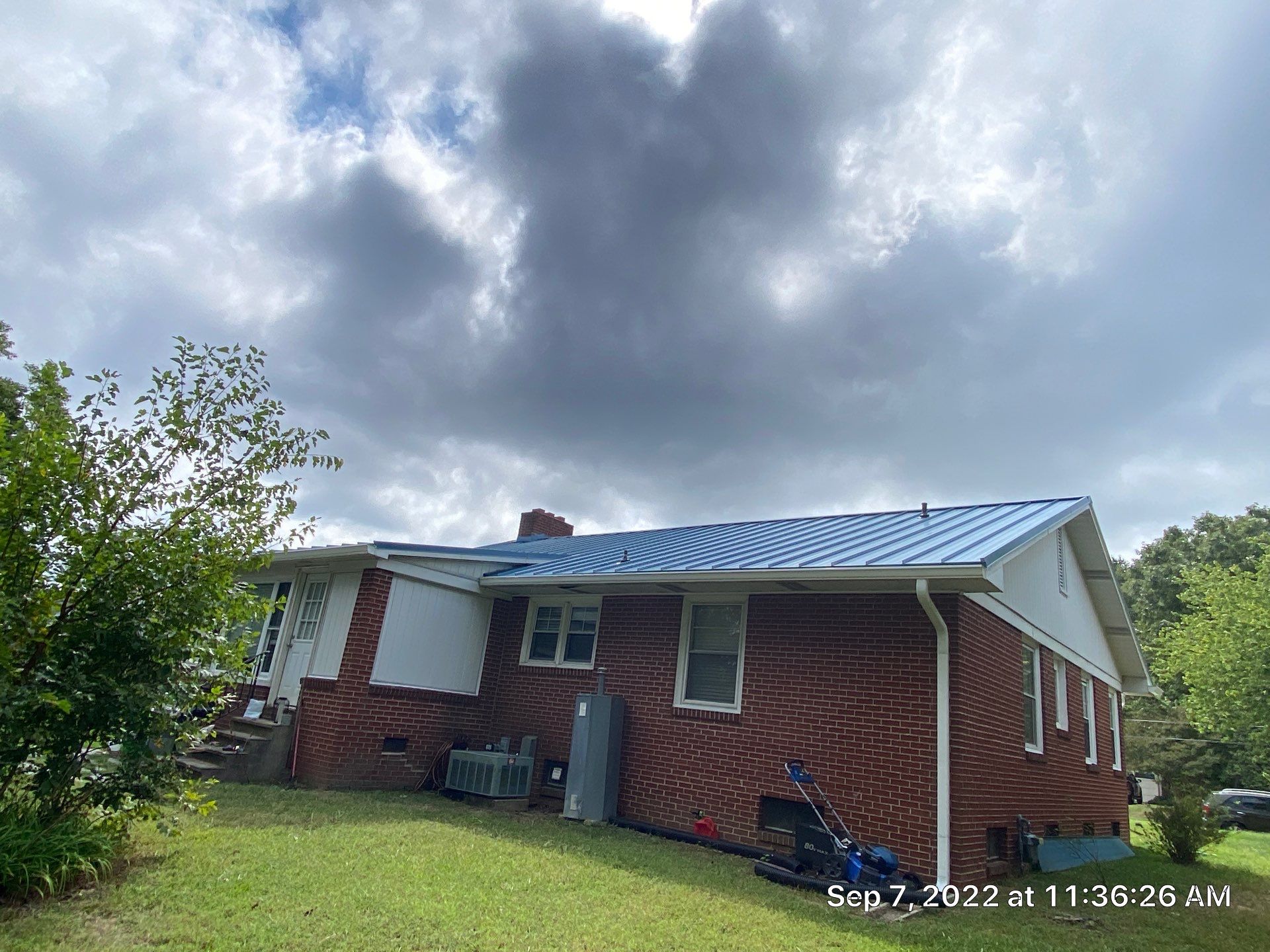 Carolina Blue Standing Seam Roof by Just In Time Roofing and Restoration