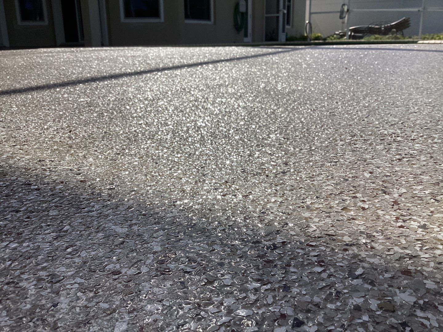 Patio using Pebble Beach by Amvet concrete coatings llc