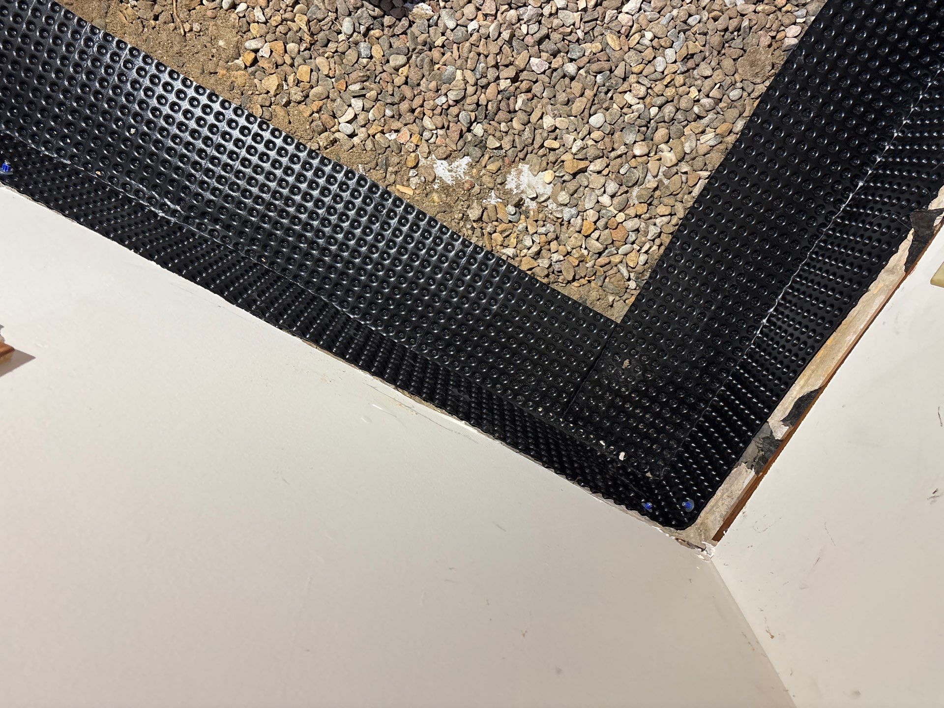 Completing the Connection for Lisa's Drain Tile System by Waterproofing Northeast