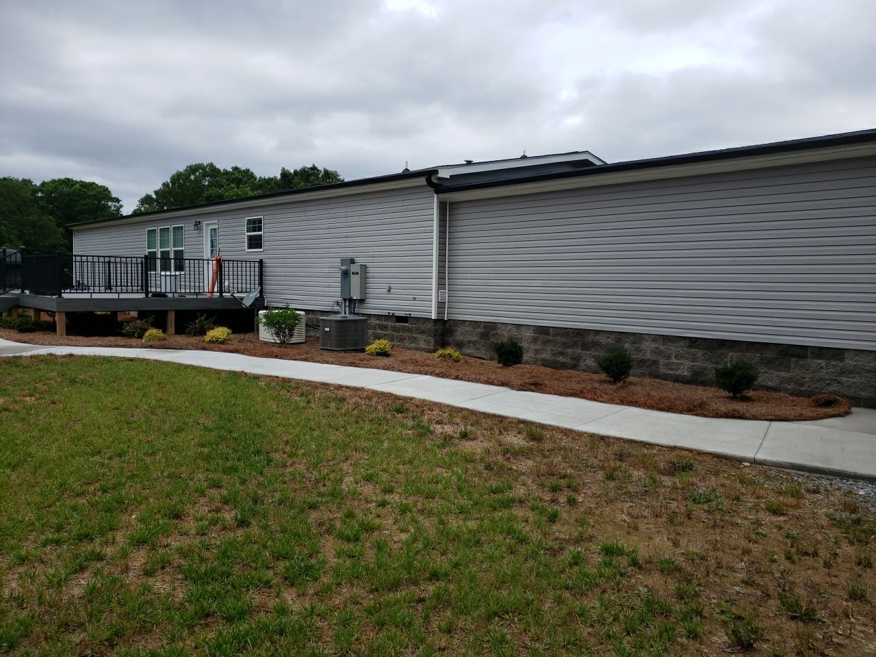 House Wash using cleaner by Power Wash Masters LLC