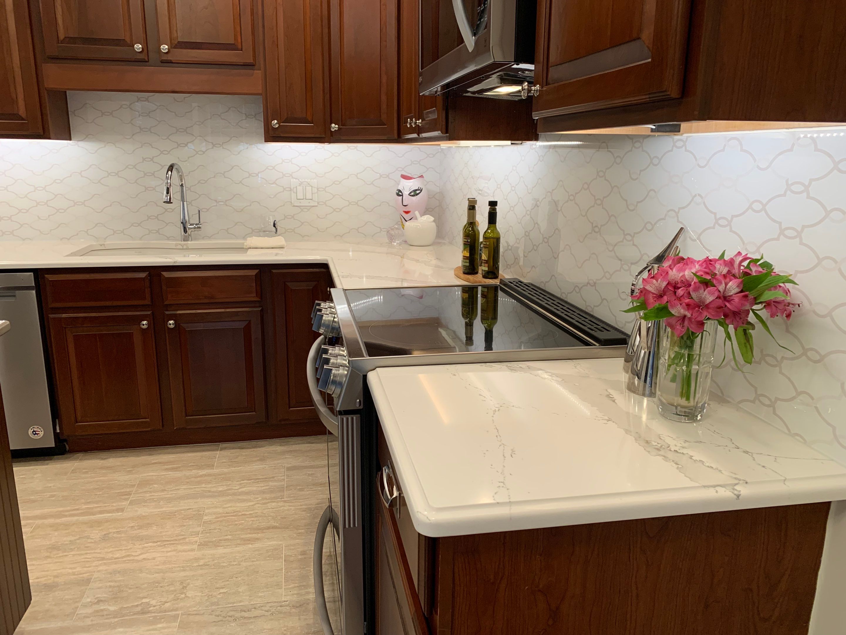 Kitchen Remodel using IMAGIO Solid Glass Backsplash Arabesque Drops by IMAGIO