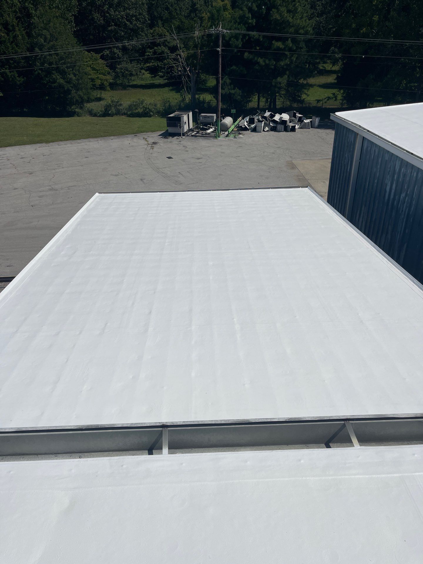 Commercial Roofing Installation using Coatings by Kentucky Commercial Roofing
