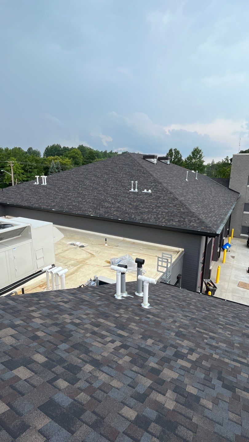 Commercial Roofing Installation using Owens Corning Duration Black Sable by Nitro Roofing and Construction
