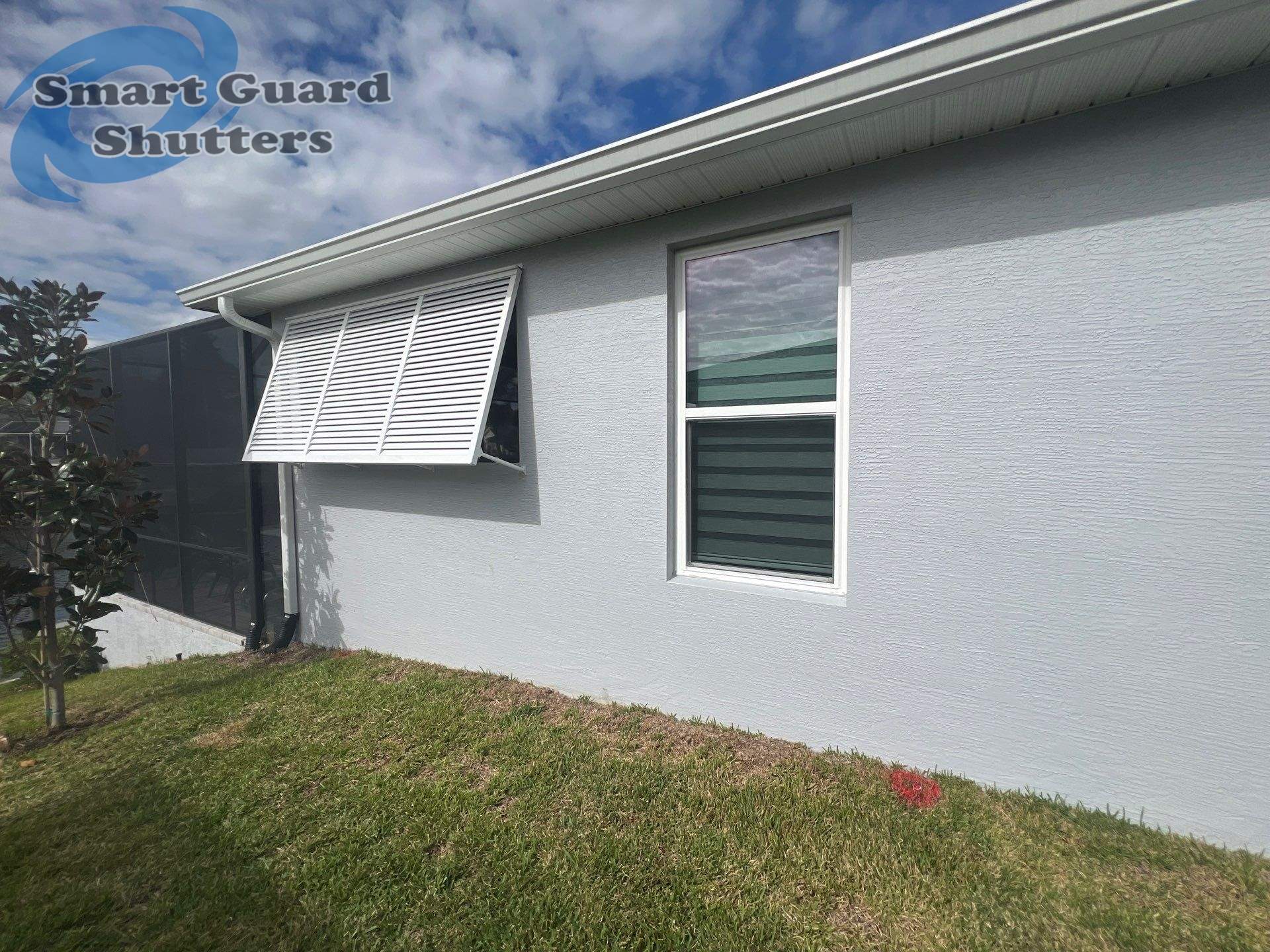 Decorative Bahamas in Signal White by Smart Guard Shutters