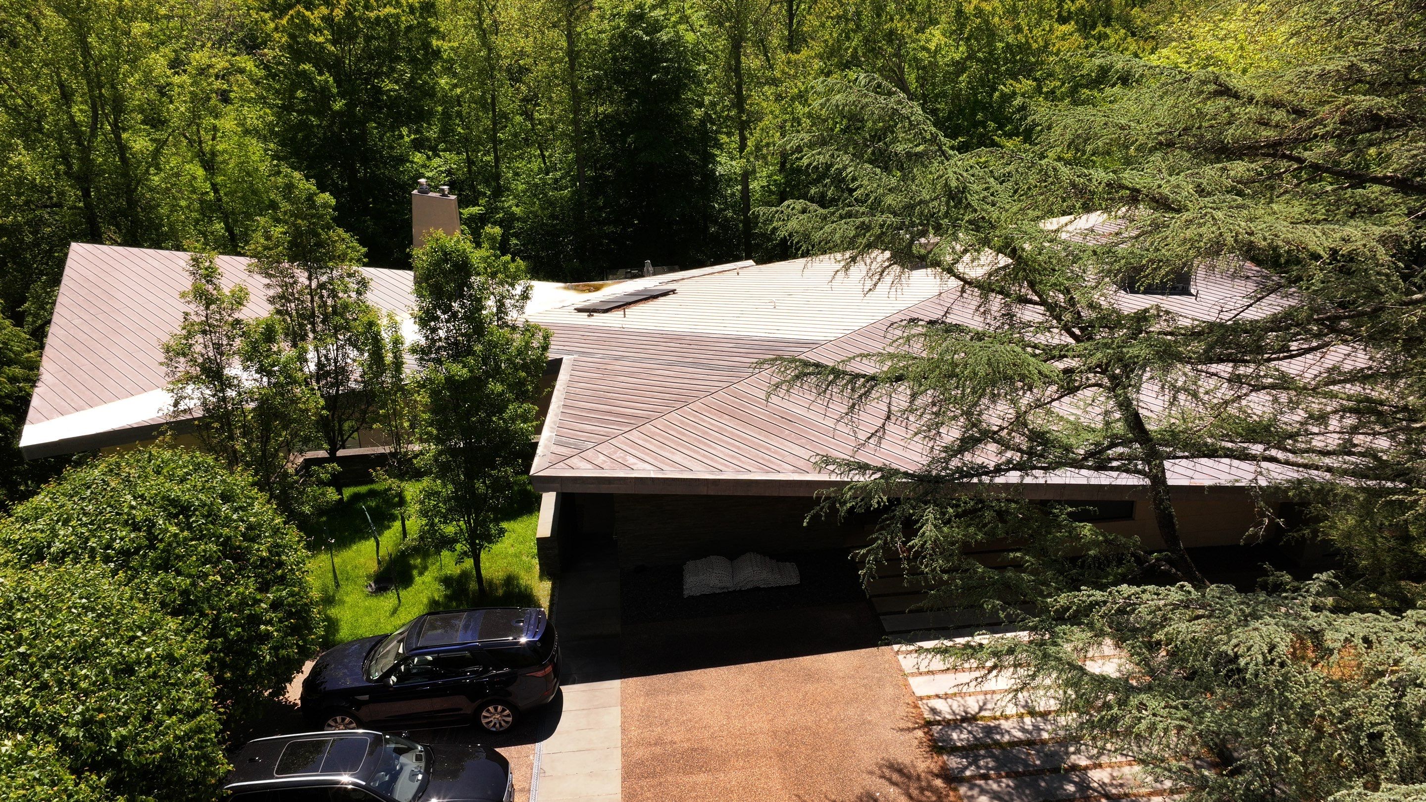 Modern Standing Seam Metal Roof Installation in McLean by American Home Contractors